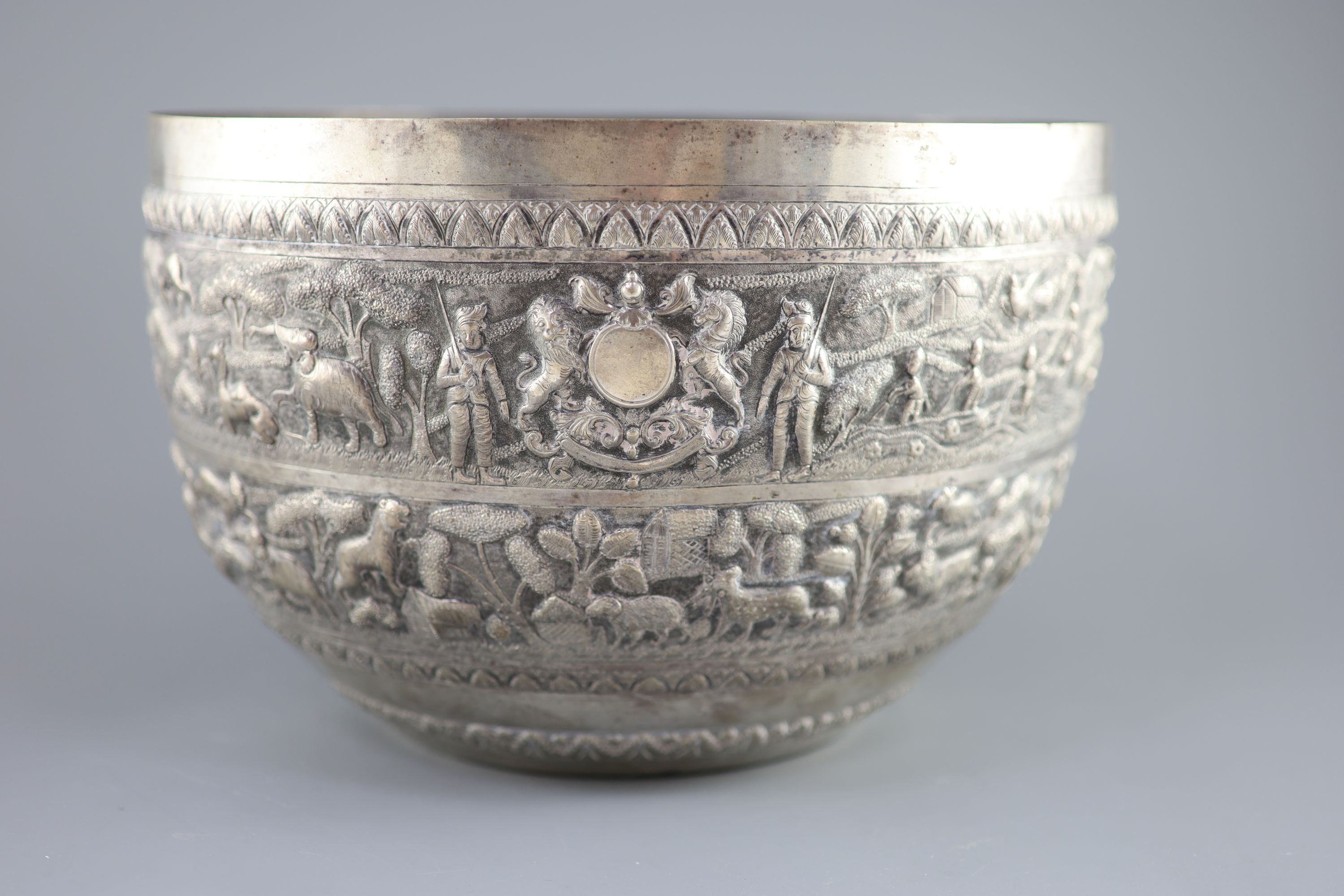 A large late 19th century Indian export embossed silver bowl, diameter 31.2cm, height 20.1cm, 36oz.